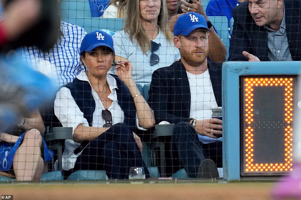 The footage was notable given it was perhaps the most intimate glimpse Meghan has given into her children and their new life in LA. In a clip shared to Instagram, the Duchess of Sussex, 44, was seen with Prince Harry and their two children on an outing to Lane Farms in Santa Barbara, and afterwards carving their Halloween decorations at home. While Meghan usually obscures her children's faces by only photographing them from behind, her latest video offered fans a peek at their features as they ran around while Prince Harry worked on his pumpkin.