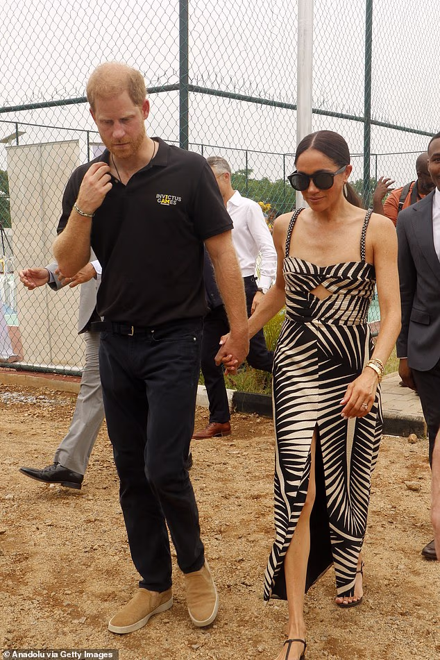 When they attended a sitting volleyball match on May 11, Harry showed his support for Invictus Games with a black t-shirt that had the tournament logo. The Duke picked a pair of black jeans and tan shoes for a look that perfectly complemented Meghan's dress and the Duchess  kept cool in her £2,275 black and beige, striped sundress
