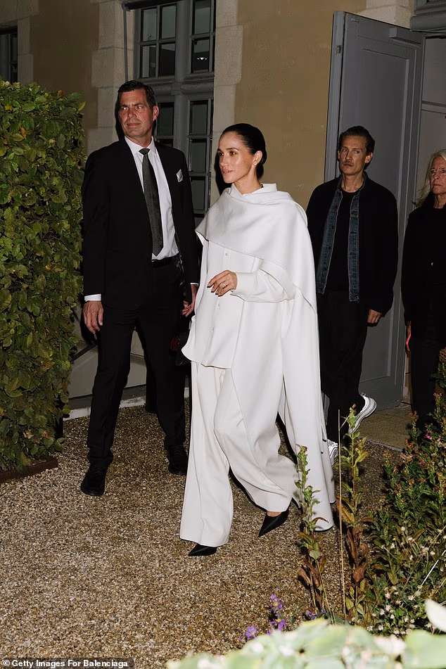 Her chic ensemble was a custom piece from Balenciaga, made by designer Pierpaolo Piccioli, who is also Meghan's friend