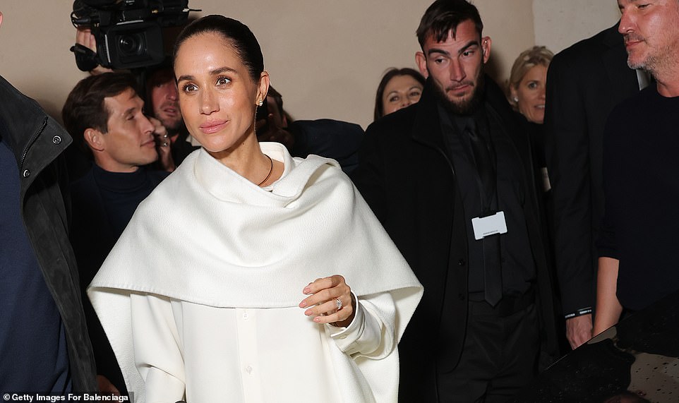 Meghan Markle had to ask for an invite to her catwalk debut on her polarising Paris trip, Balenciaga 's top designer has sensationally revealed. The Duchess of Sussex said the visit to Fashion Week in the French capital was 'the culmination of many years of…friendship' with Pierpaolo Piccioli. But Mr Piccioli has been rather more muted in his response, suggesting that their friendship is one of casual texting.