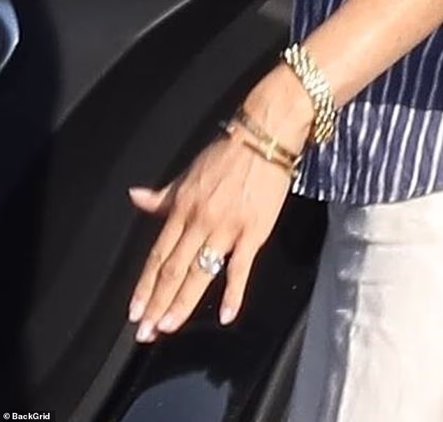 She appeared to be wearing her staple £5,850 Cartier love bracelets and Princess Diana's Cartier watch