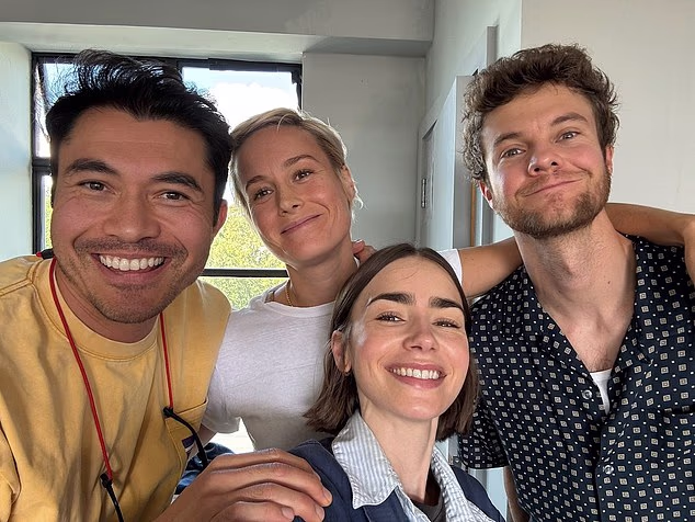 Meghan is starring in the film alongside Henry Golding, Brie Larson, Lily Collins and Jack Quaid (left to right)