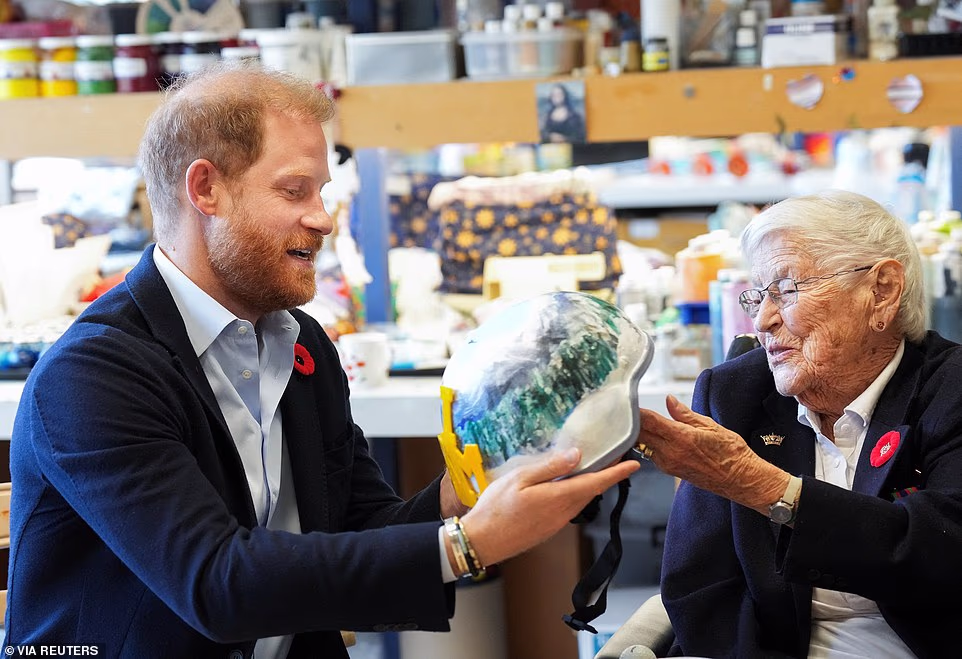 Speaking to veteran Brenda Reid (pictured), Harry asked what the veteran's most memorable war story was, Ms Reid cautioned that, when it comes to her fellow residents, 'you can't always believe the boys'. Ms Reid, 101, enlisted in the Royal Canadian Navy and was posted to a station in Nova Scotia run entirely by women during the Second World War As a humorous gift, Harry was presented with a Toronto Blue Jays cap. Yesterday, the Duke spent time with members of Canada's Reserve Forces in Toronto, meeting with soldiers from two historic Army Reserve units.