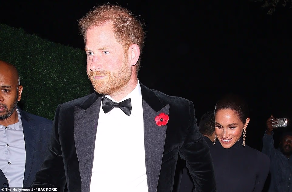 He told the Daily Mail: 'He looks fed up being paraded, one day at sports match and on another day at a celeb party. 'Clearly, he is now worried what revenge his brother might one day carry out against himself and his ambitious wife.' During her 2024 video message, Meghan wore a five-petalled poppy, traditionally worn by royals. While in 2021 she had a poppy attached to her outfit as she joined The New York Times DealBook Online summit in New York City. Photographer Calla Kessler posted an image on social media at the time of Meghan with her poppy and said she had asked her about why she was wearing it. 'I asked her about the poppy. It's for Remembrance Day, to honor armed forces members,' she said.