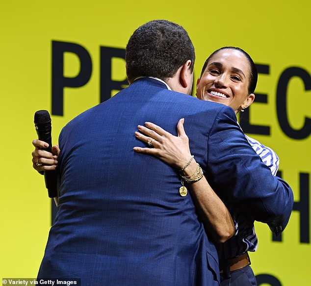 The Duchess hugs another attendee at Project Healthy Minds World Mental Health Day Festival