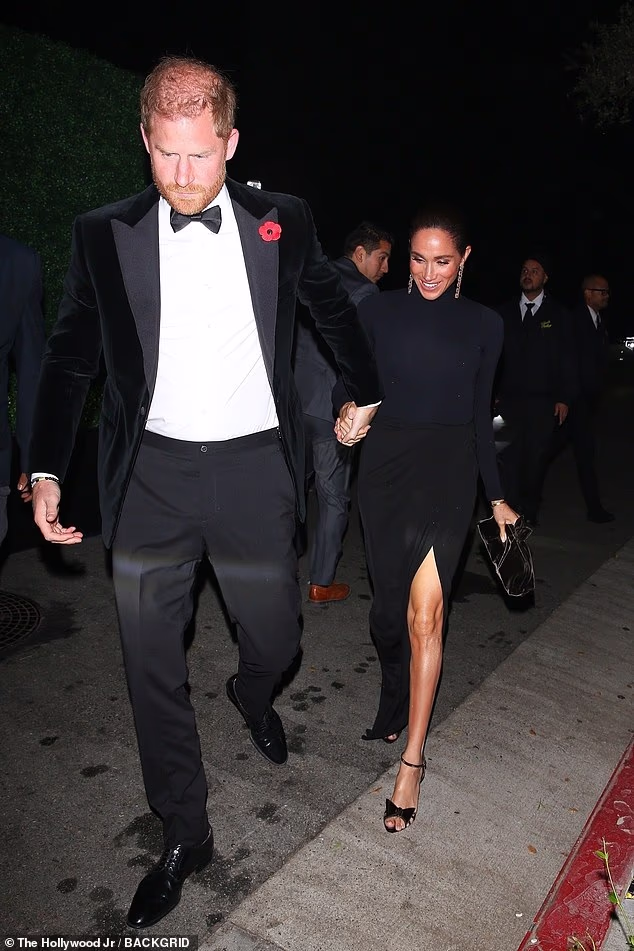 Meghan was pictured on the arm of husband Prince Harry walking into Kris' 70th birthday which was Bond themed