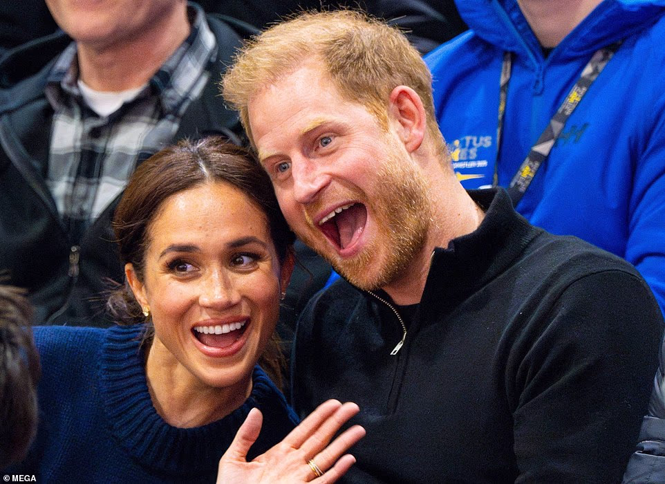 Its writer reveals how Meghan puts her hand on her heart when she talks about her husband. 'No one in the world loves me more than him, so I know he¿s always going to make sure that he has my back,' the Duchess declares. Ms Greenidge also reveals that during their wide-ranging interview Meghan is brought an 'unsolicited' cappuccino over by a waiter at the Beverly Hills Hotel with her face in the milky foam. The article says: '¿Oh,¿ she [Meghan] says, smiling down at it. "I recognise this picture. That¿s from our trip to South Africa". (Prince Harry and Meghan toured the country in 2019.) It¿s a lovely and absurd perk of celebrity, and Meghan is tickled enough to take a photo of it.' Ms Greenidge adds that the decision meet at the Beverly Hills Hotel is a 'calculated choice'.