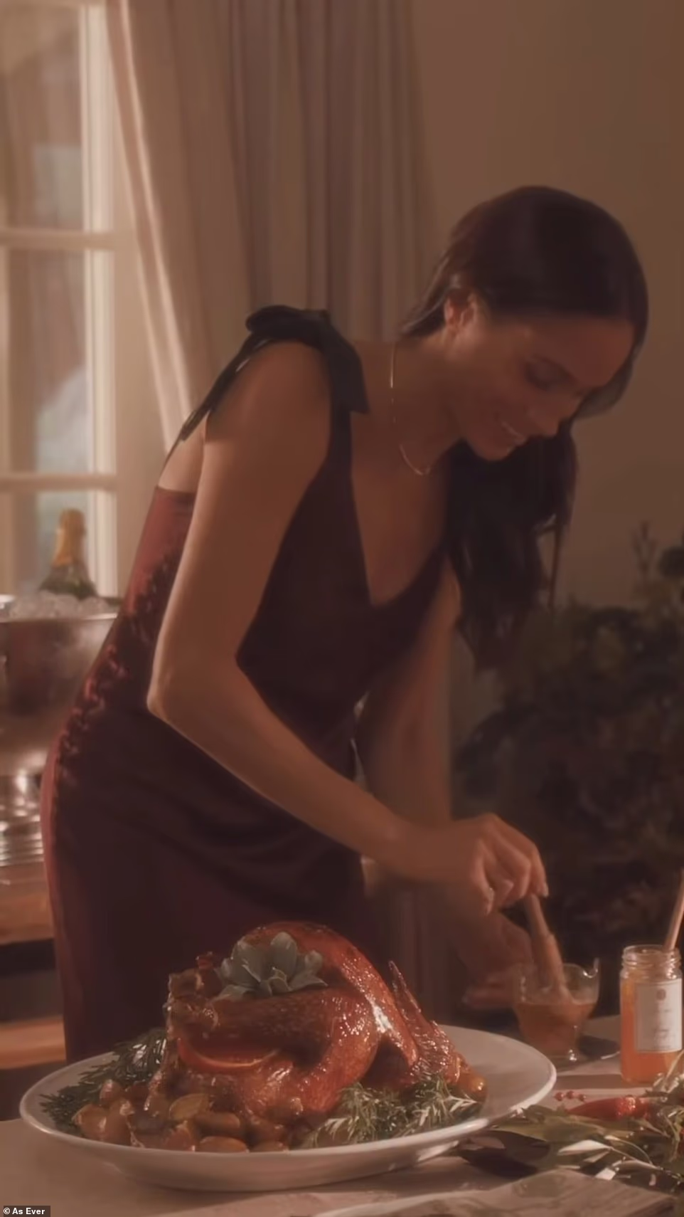 Of course, she also had on her diamond engagement ring from husband Prince Harry that's estimated to be worth $150,000. That means in total, Meghan was wearing a pricey outfit and accessories that amounted to a total that was well over $200,000 - $247,145.00 to be exact. On X, formerly Twitter, some users took issue with her outfit and holiday photo shoot, as one user typed, 'Nothing screams authenticity quite as remarkably as a woman, basting a chicken, in a satin frock, without an apron...'