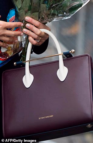 A close up of the Strathberry bag that Meghan carried during her first royal engagement with Prince Harry in 2017