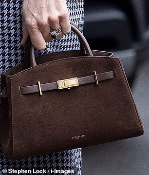 Catherine, 43, debuted a new DeMellier bag during her recent visit to the Anna Freud Centre