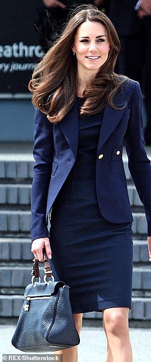 Catherine photographed at Heathrow ahead of her and Prince William's royal tour of Canada/ She is seen carrying Mulberry's Polly Push-lock shoulder bag