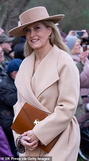Sophie, 60, opted for an understated yet elegant outfit when she attended the Christmas morning service at St Mary Magdalene Church in Sandringham three years ago. Her tan clutch with gold hardware elevated the beige coat and matching hat