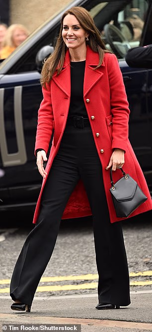 Catherine reached for her Grace Han 'Black Love Letter Small Top Handle' bag bwhen she travelled to Wales for an official visit with Prince William in September 2022