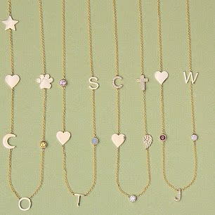 Available in yellow gold, rose gold or white gold, the necklaces can be personalised with letters, charms and birthstones, making each piece unique