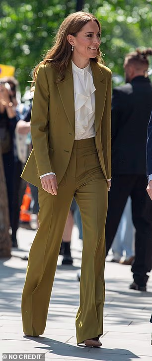 Kate wore a Victoria Beckham chartreuse trouser suit while presenting the Queen Elizabeth II Award for British Design at the British Fashion Council