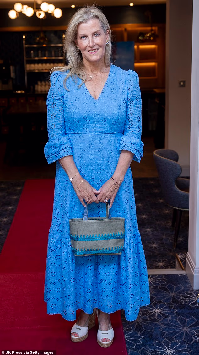 Sophie, Duchess of Edinburgh's approachable sense of style was evident at an afternoon tea in Windsor, where she chose a cornflower blue broderie dress from Aspiga, which sold out soon after her appearance