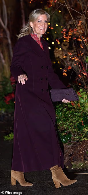 She also embraced autumn's defining shade, burgundy, choosing a rich Alaïa coat for the Together at Christmas carol service