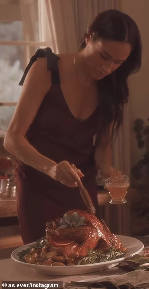 In one scene, she opted for a burgundy slip dress by Heidi Merrick. With its plunging V-neckline and delicate tie-shoulder detailing, the design delivered a refined take on classic eveningwear