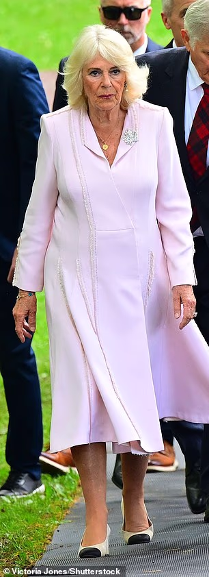On her tour of Canada, the Queen opted for a pastel pink Anna Valentine coat dress, first worn to the Duke and Duchess of Sussex's wedding
