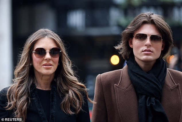 Model Elizabeth Hurley arrives at the High Court accompanied by her son Damian Hurley