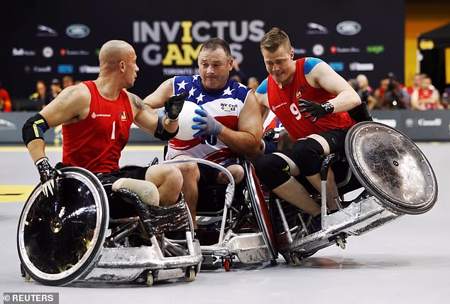 Competitors from the United States and Denmark compete during their semi final wheelchair rugby match at the Invictus Games in Toronto. This image was shared by Meghan