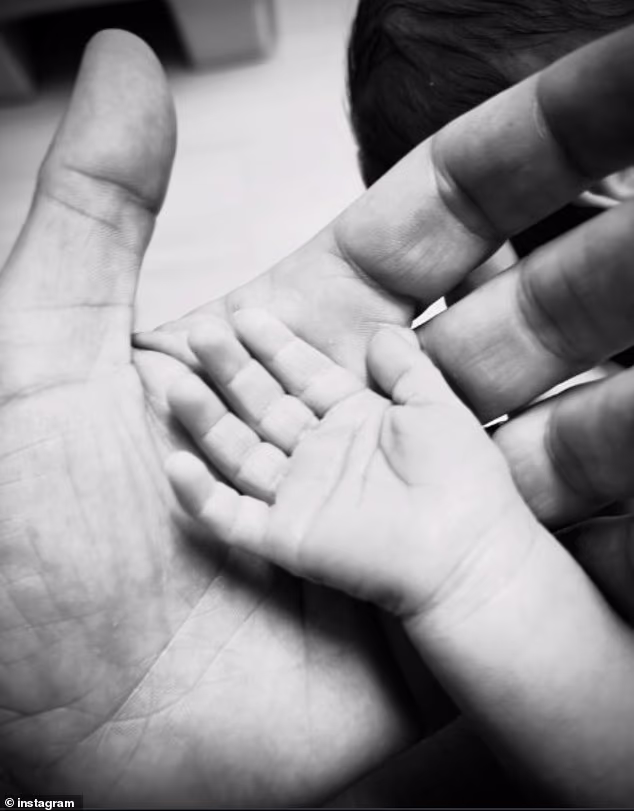 The Suits star, 44, quietly announced the arrival of the couple's third child on Tuesday by sharing a tender photo of his large hand gently cradling his newborn's tiny palm