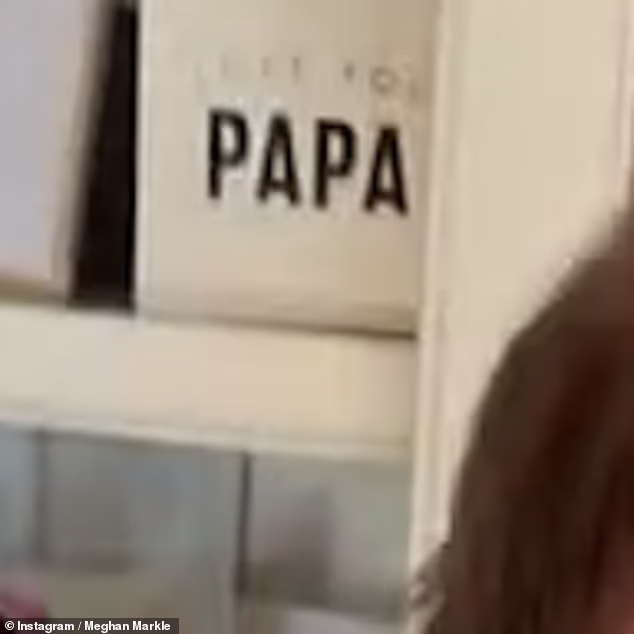 Like many proud fathers, Prince Harry's love for his children was also made clear in his décor choices- with a heartwarming print with the word 'PAPA' on the front spotted on display in the background