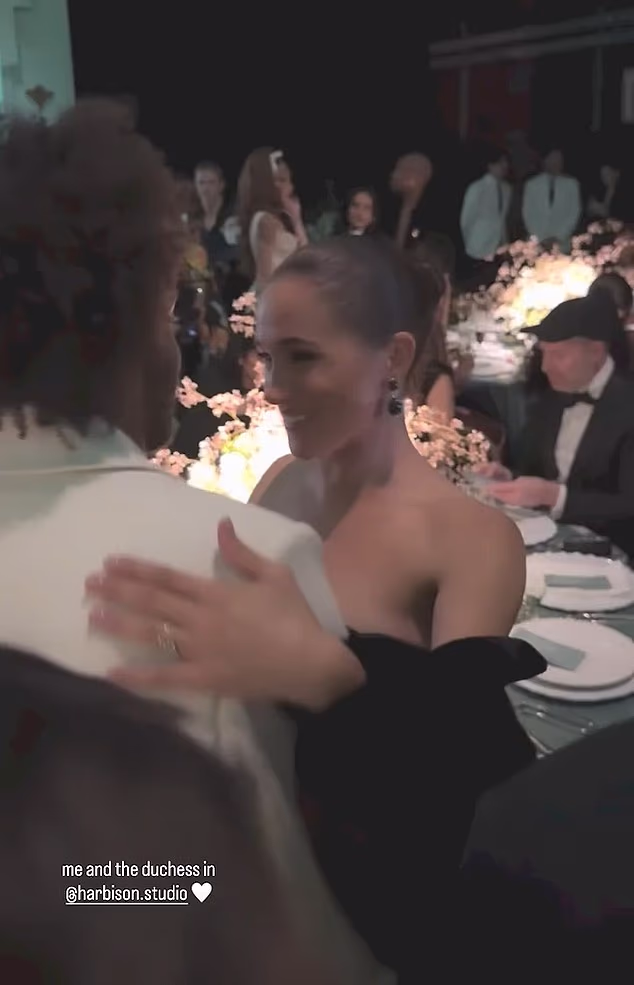 Meghan was shown smiling and hugging guests at the black tie event including the designer of her outfit, Charles Harbison
