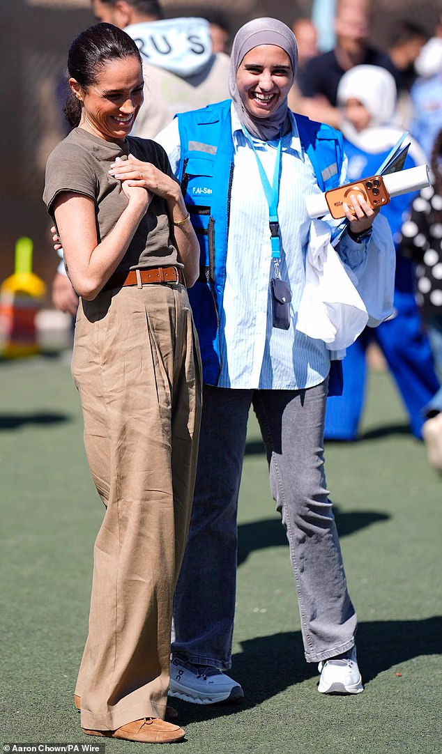 The Duchess of Sussex appeared to channel Angelina Jolie during a visit to the QuestScope Youth Center at the Za'atari refugee camp on Wednesday