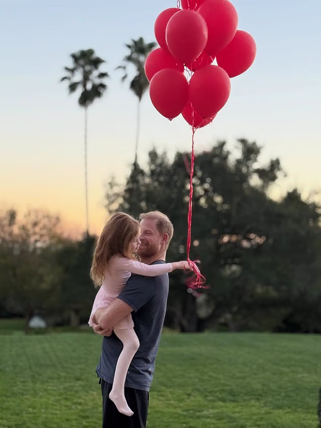 The Duchess of Sussex, 44, took to Instagram this evening to share a snap of Lilibet, four, cuddling her adoring father as she holds a bunch of red balloons