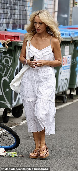 Pictured on March 3 wearing a very Meghan, floaty babydoll dress