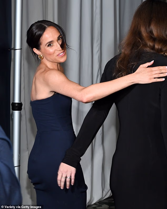 Meghan was all smiles as she appeared on the red carpet at a charity bash alongside her best friend Kelly Zajfen