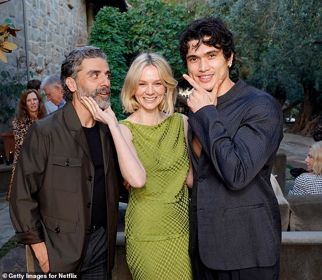 Riverdale star Charles Melton (right), Oscar Isaac (left) and British actress Carey Mulligan (centre) at the event