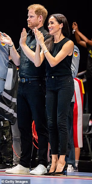 Meghan's J Crew top and ankle skimming jeans