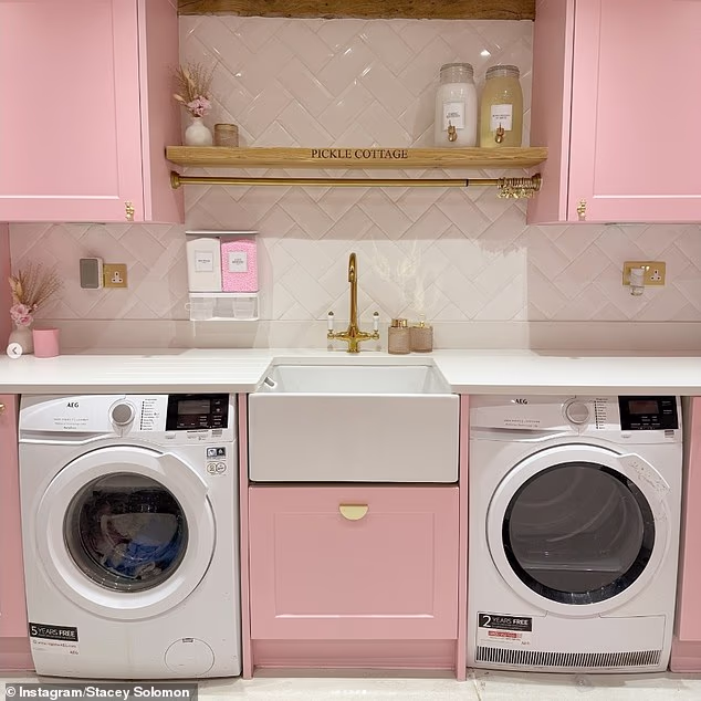 Reality star Stacey Solomon keeps her two washing machines exposed in her pink utility room