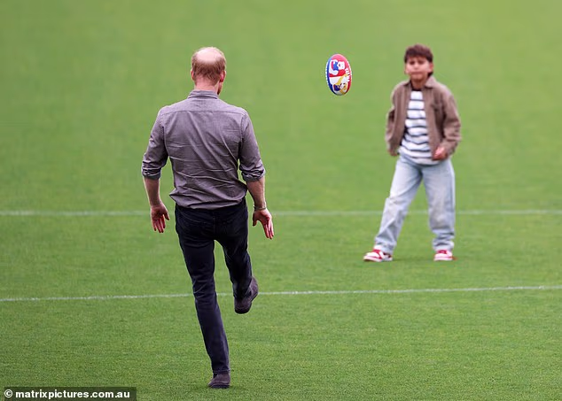 One lucky youngster got to have a kick around with the royal
