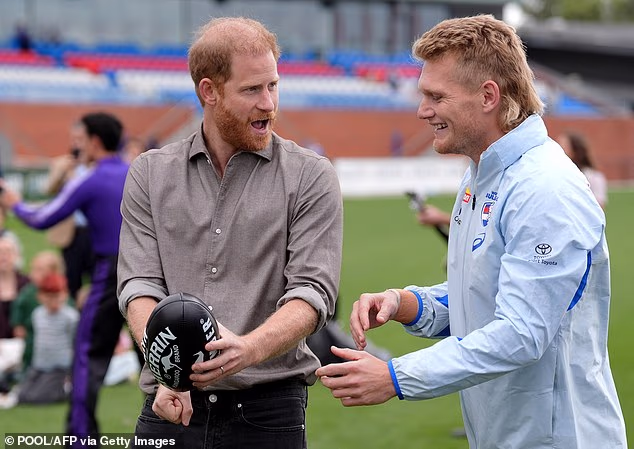 He appeared in good spirits - but Meghan Markle was nowhere to be seen