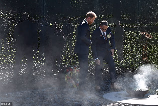 The prince is pictured attending a smoking ceremony at the 'For Our Country' during his visit to Canberra