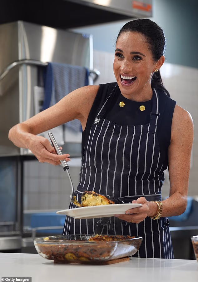 Visiting the McAuley Community Services for Women, the Duchess of Sussex (pictured yesterday), 44, was praised by one resident over her 'glowing' complexion as she gushed 'you look like a model'