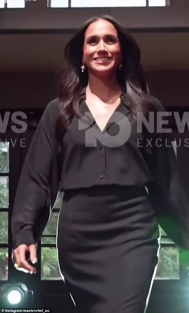 Meghan exuded confidence and style as she strode onto the MasterChef set in a sleek black ensemble