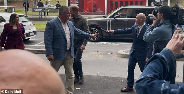 15737129 Aussies are saying the same thing about this moment between Harry and Meghan as couple begin third day of tour: 'A love like this'