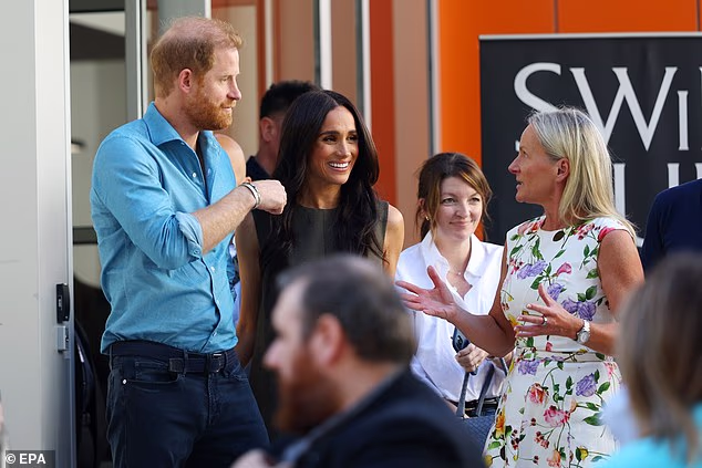 Prince Harry and Meghan, the Duke and Duchess of Sussex, depart Swinburne University after a visit to the 'batyr'