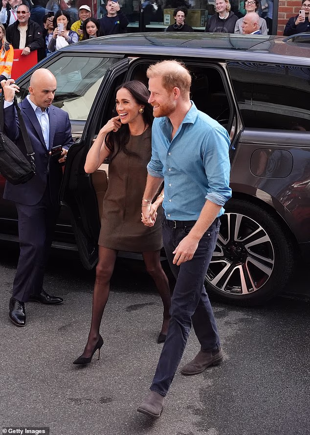 For her visit to Swinburne University with Prince Harry, the Duchess wore a £286 'Anya' dress from Australian label Friends with Frank, as well as Wolford tights and Manolo Blahnik pumps