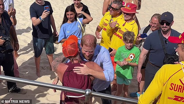 He then cornered Harry for a sweaty hug and proper photo (pictured)