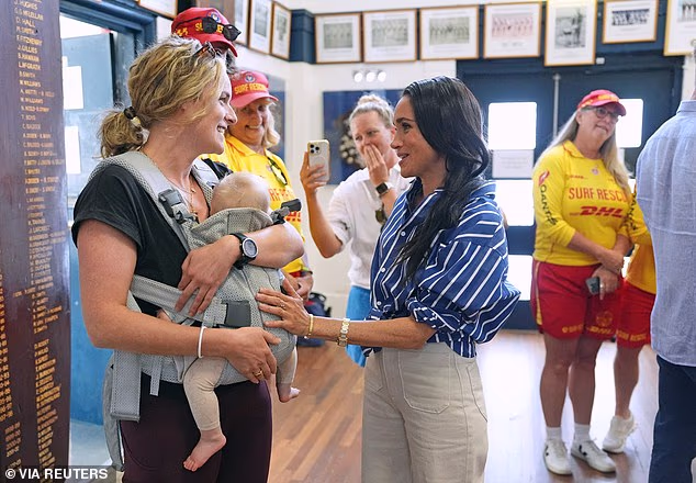 Pictured, Meghan meets Romi Arnott with her 10-month-old daughter Sophie