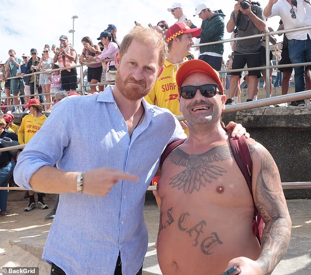 Harry poses with his new Aussie friend