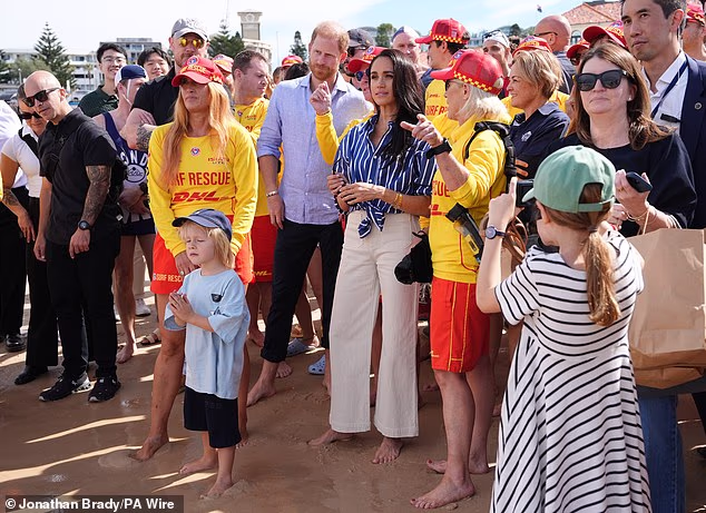 The Duke and Duchess of Sussex meet volunteer first responders from Bondi Surf Bathers' Life Saving Club