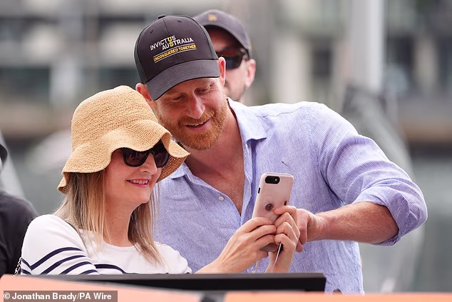 Harry also got into the spirit to pose for a photo