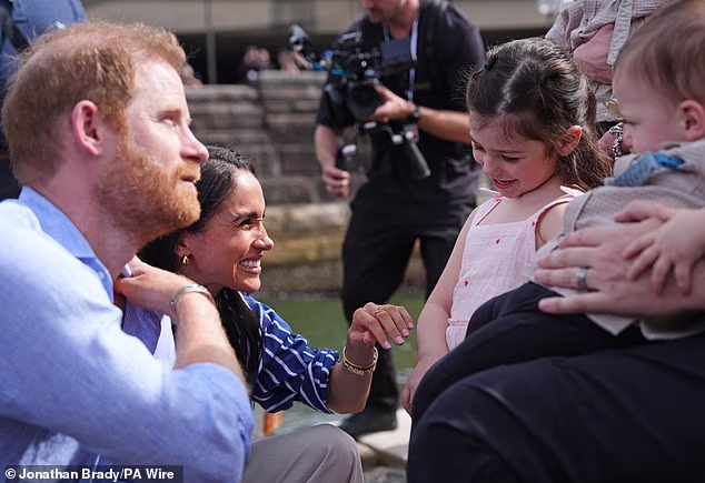 Harry dances with Charlotte after Meghan told her he is 'very good at twirling'