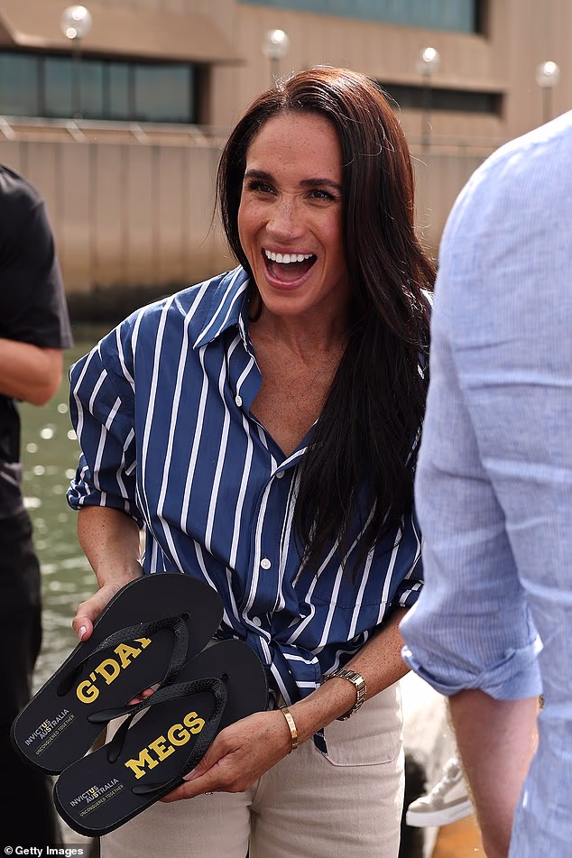 Harry and Meghan were also gifted customised flip-flops as they met members of Invictus Australia on Friday